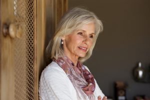 Close up beautiful older woman thinking Close up beautiful older woman thinking